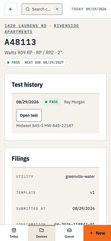 A device record showing its serial as the heading, the test history, filings, the next-due panel and a Start test button. Shown on a phone.