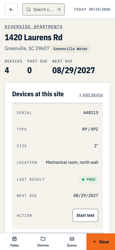 A site record with the access panel, showing the gate code masked behind a reveal control. Shown on a phone.